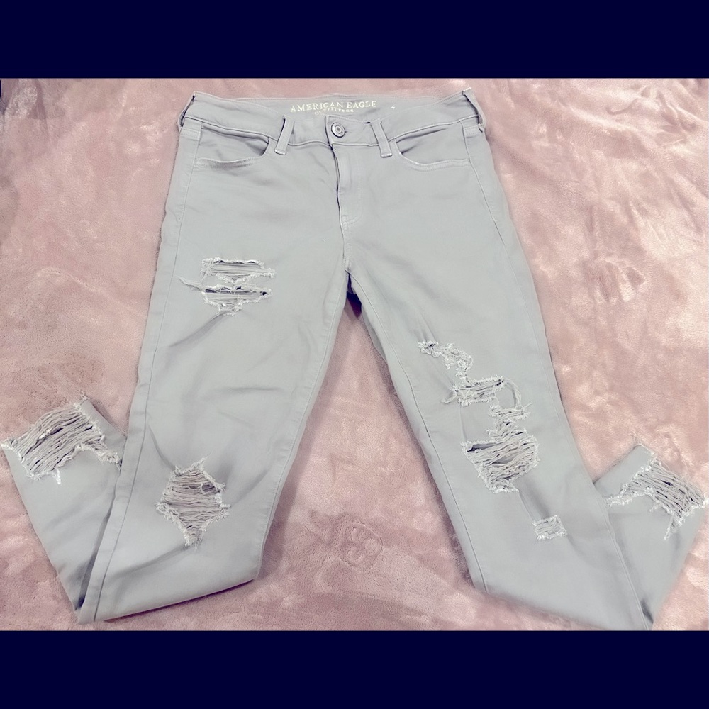 SOLD American Eagle Ripped Gray Super Stretch X Jeans